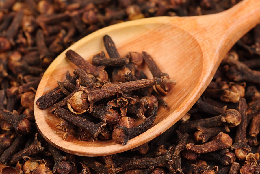bigstock-Cloves-spice-And-Wooden-Spoo-45136120